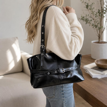 Glossy Dual-Tone Slouched Rectangular Shoulder Tote With Metallic Buckle Front Belt, Eyelet Adjustable Single Shoulder Strap And Segmented Panel Stitching