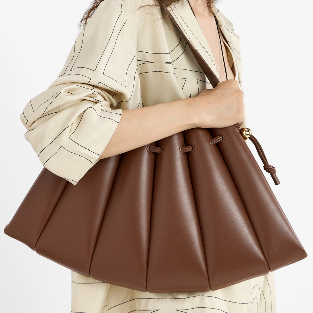 Warm Cocoa Brown Sculptural Fan Pleated Shoulder Bag With Golden Spherical Drawstring Hardware And Slim Matching Single Carry Strap