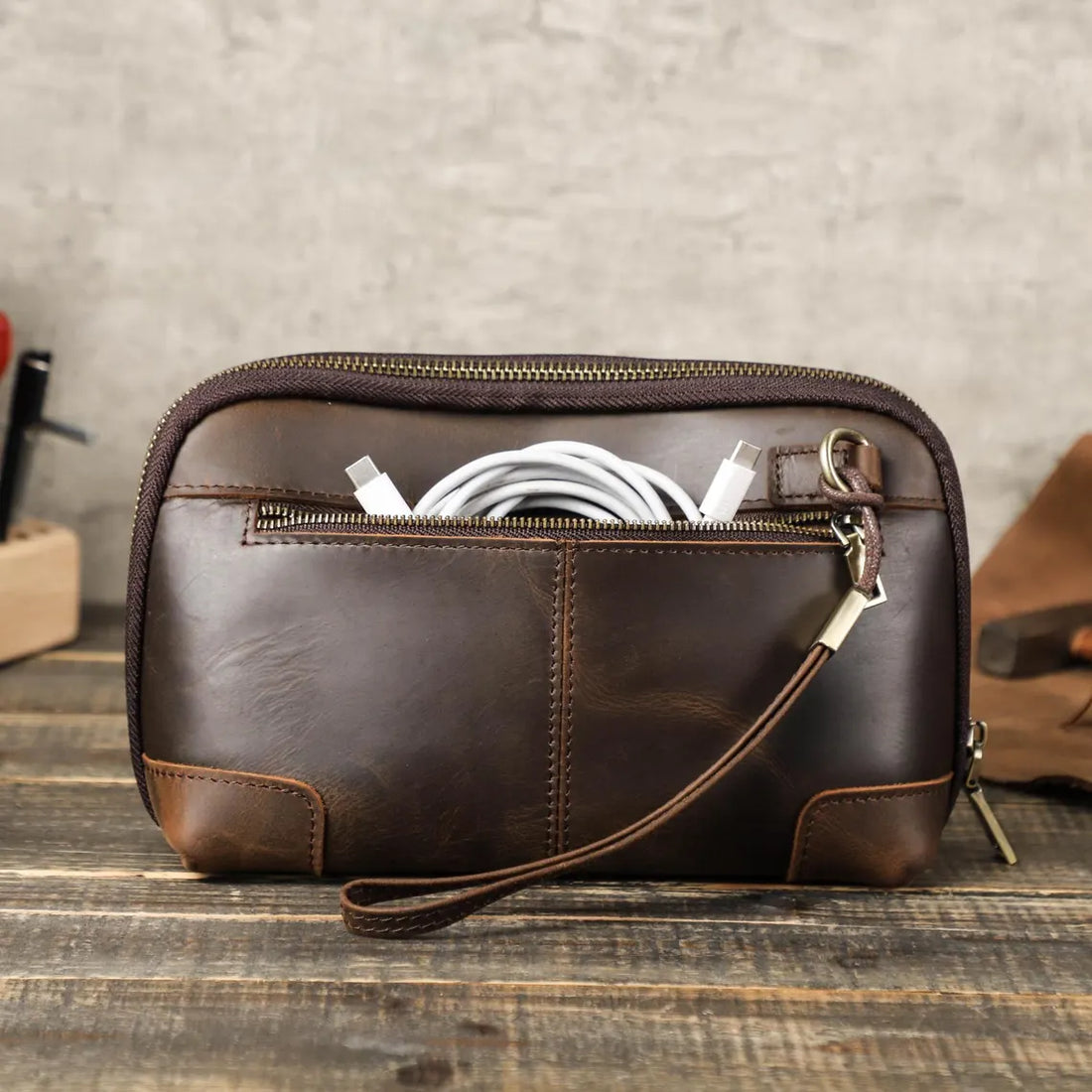 Deep Weathered Chocolate Rectangular Gadget Storage Pouch With Reinforced Corner Stitching, Front Slip Pocket And Attached Thin Wrist Tether Strap